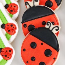 Making Ladybug Cookies, Cookies decorated as ladybugs.