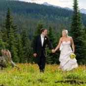 A married couple in a moutain setting.