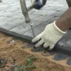 How to Install Paving Stones, Man Installing Paving Stones