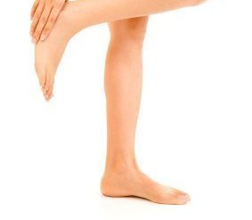 Homemade Foot Powder, Woman Holding Her Foot