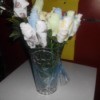 Vase of washcloth flowers.