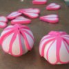 Heart shapes on outside of clay balls.