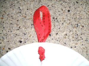 Ribbon hanger through the plate top.