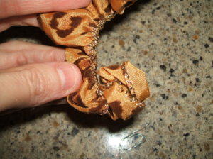 Beginning to roll from knotted end.