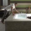 How to Choose a Bathtub, Man Filling a Bathtub
