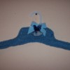 Blue crocheted clothes hanger.