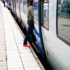 Public Transportation, Woman Getting on Light Rail Train