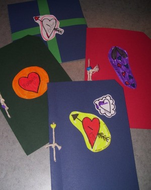 Drawings added to outside of cards and an envelope.
