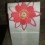 Flower attached to gift bag.