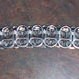 A choker necklace made from pop tabs.