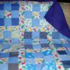 Repurposing Clothing In Crafts by making a quilt.