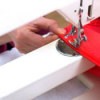 Sewing stretchy fabric with a sewing machine.