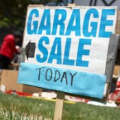 A blue garage sale sign.