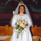 Bride wearing a wedding dress.
