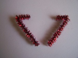 Pipe cleaner arms.