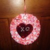 Paper wreath covered in foam cut-out hearts