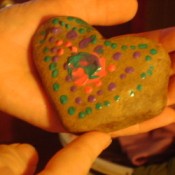 Painted Rocks - the heart shaped front of the rock, painted with puffy paints.