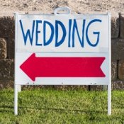 Sign Pointing to a Wedding