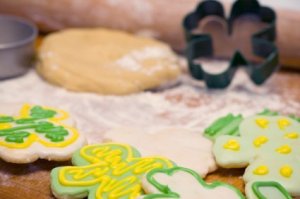 Making shamrock cookies for St. Patrick's Day.