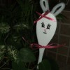 Plant poke in potted plant.