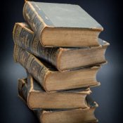 Stack of very old encyclopedias.