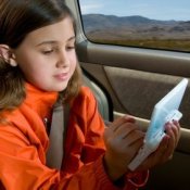 Child on a road trip.