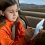 Child on a road trip.