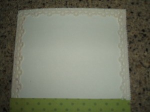 Scalloped edge glued to card.
