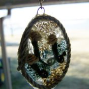 Suncatcher Pendant in a window.