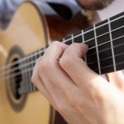 man playing guitar