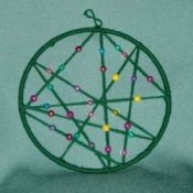 Hanging beaded dream catcher.