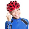 A woman wearing a bike helmet.