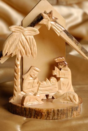 Carved wood manger.