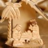 Carved wood manger.