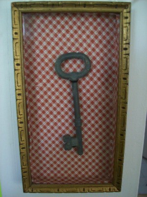 Heirloom Shadowbox with a skeleton key.