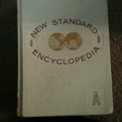 White leather volume of encyclopedia.