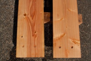 Two Stained Boards Drying