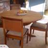 Round dining table and four chairs.