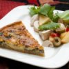 Quiche Being Served on White Plate