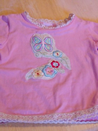 Shirt made by coming two stained shirts.