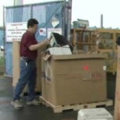 Man Recycling a TV