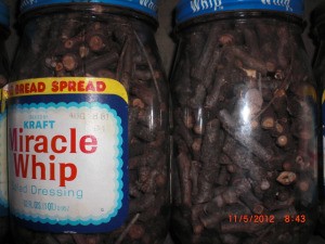 Packing Away Fuel For Emergencies  - small sticks in jars.