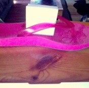 Pink flip flop with a Magic Eraser