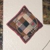 Printed quilt block in embroidery hoop.