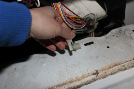 Detaching control panel electric connection