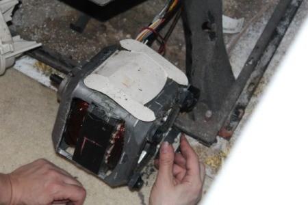 Motor removed from Kenmore washing machine.