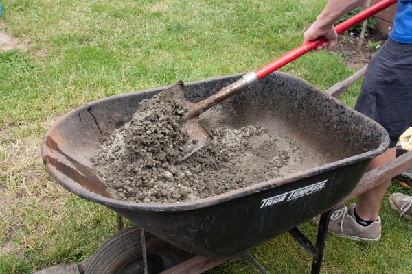 Mixing Concrete in Wheelbarrow