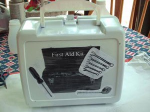 Finished back side of first aid box with tool motif.