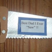 Hand saw shaped magnet.