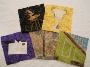 Five paper pieced quilt blocks.